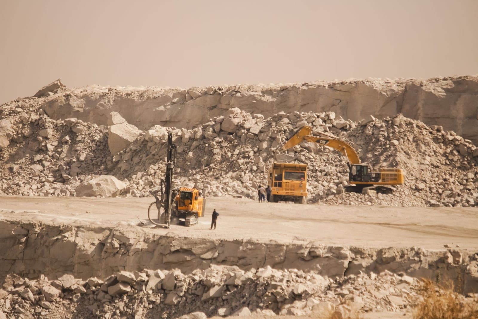 Drilling and excavators at a quarry in Kaduna State